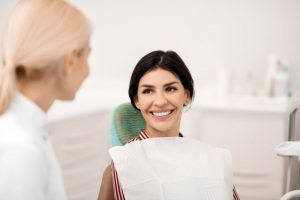 woman smiling in dental chair